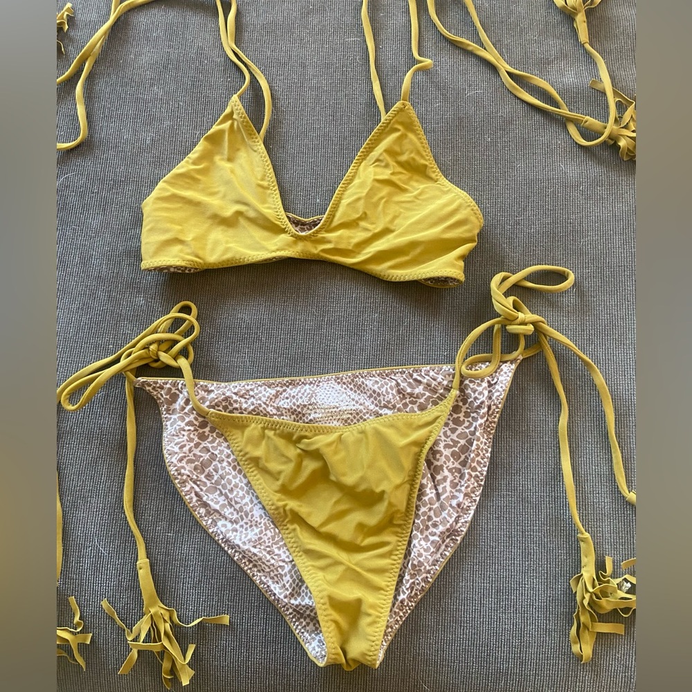 Acacia mustard color bikini bottom that is reversible. Size medium.